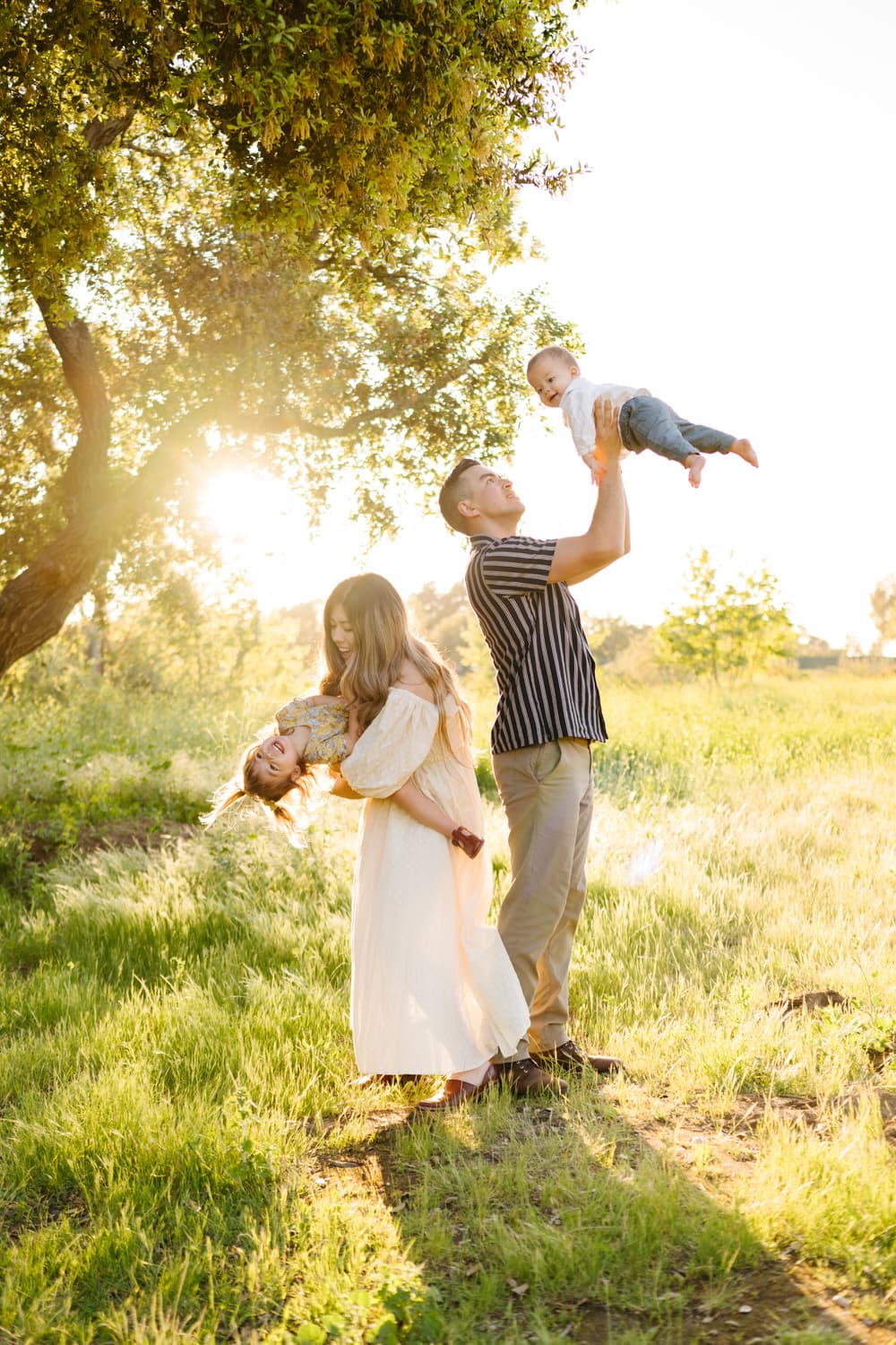 A family together in a golden field
