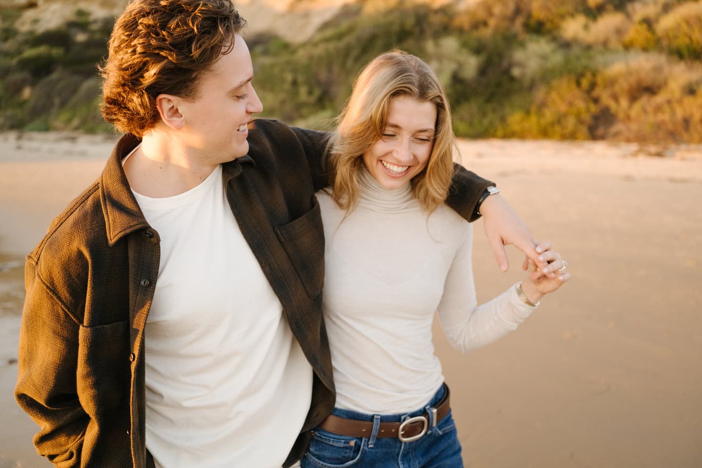 A couple walking together at the beach